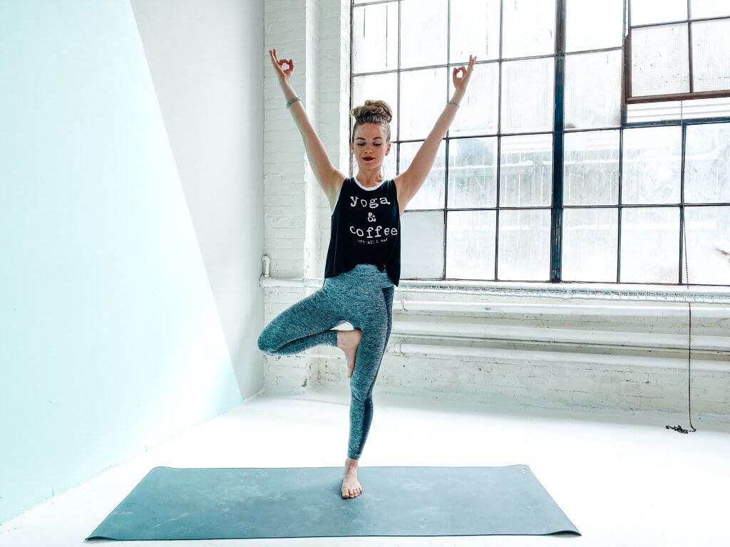 Woman demonstrating Tree Pose for balance.